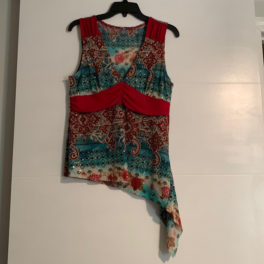 Large Sleeveless top by Tempted.